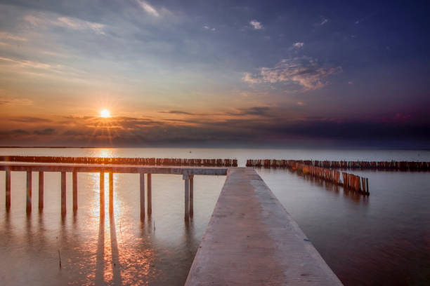 istock Cement bridge the pier extending into the sea 1140315510