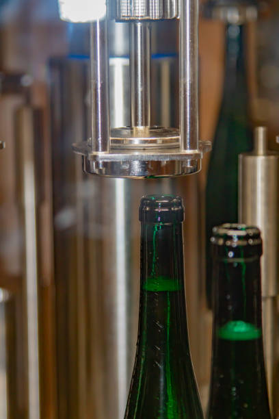 istock in a winery wine gets bottled automatically in a filling station 1140316252