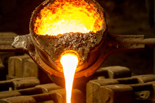 istock metal casting process with red high temperature fire in metal part factory 1140317448