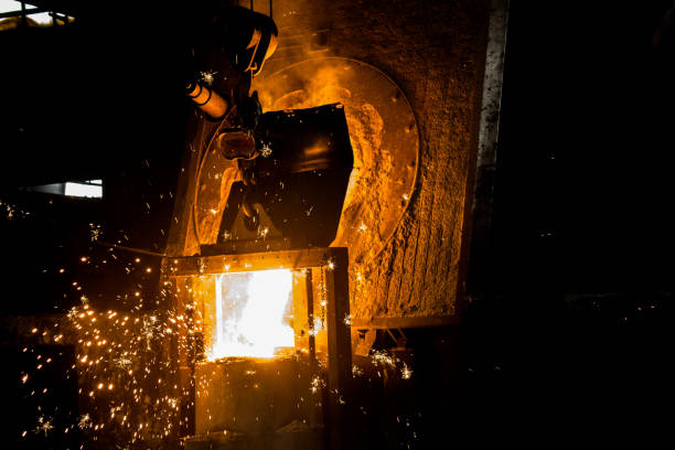 istock metal casting process with red high temperature fire in metal part factory 1140317450