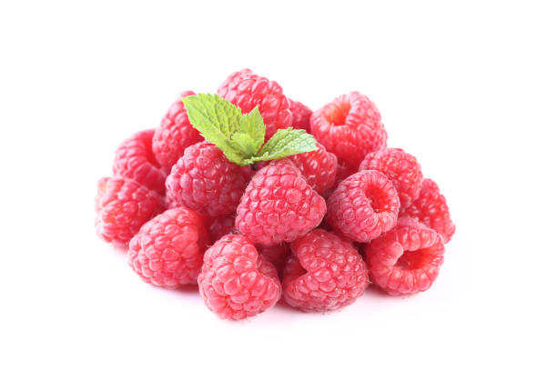 istock Ripe raspberries with green leafs isolated on white background 1140319725