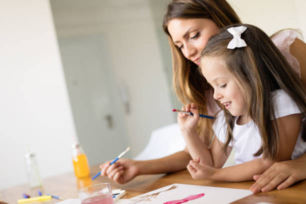 istock Happy family having fun time at home 1140322822