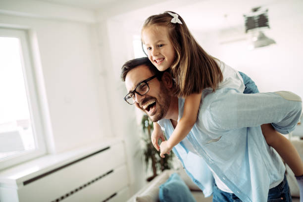 istock Happy family having fun time at home 1140322839
