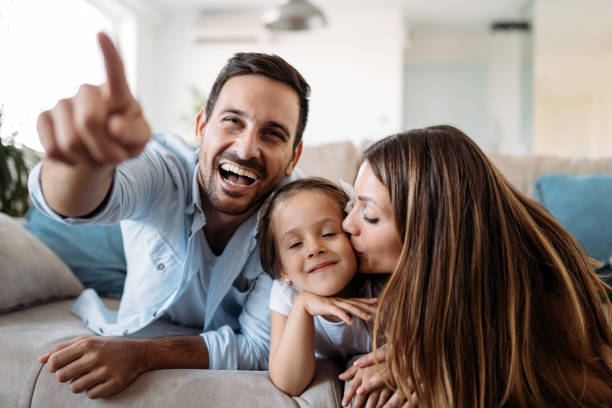 istock Happy family having fun time at home 1140322912