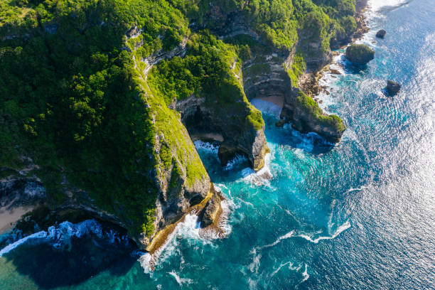 istock Blue ocean and cliffs. Bali shores from above. Aerial drone shot. 1140323043