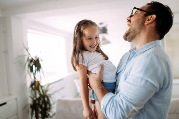 istock Happy family having fun time at home 1140323670