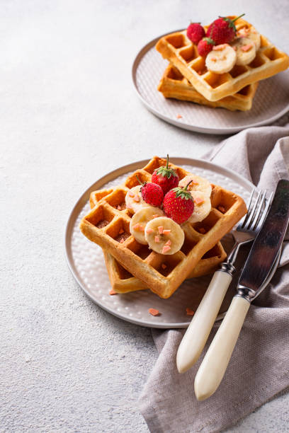 istock Waffles with strawberries and banana 1140324379