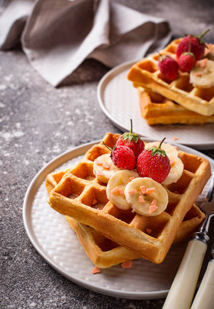 istock Waffles with strawberries and banana 1140324381