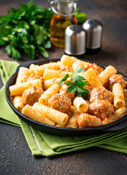 istock Pasta with meatballs in tomato sauce. 1140324390