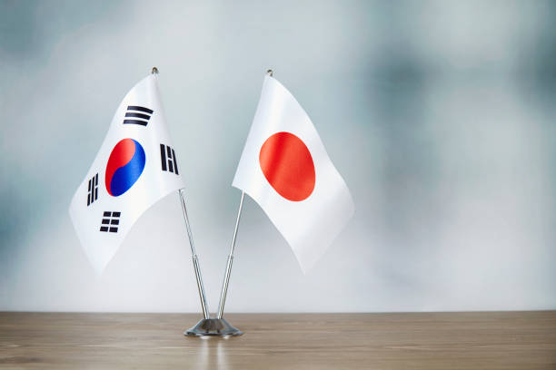 istock South Korean and Japanese flag standing on the table 1140324567
