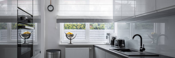 istock Narrow kitchen with contemporary furniture 1140326943
