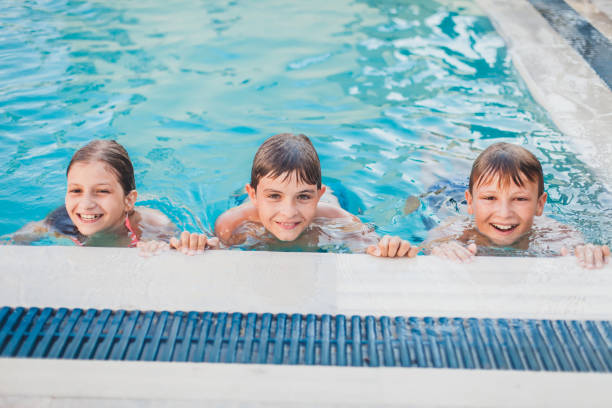 istock Children at the Swimming Pool 1140329598