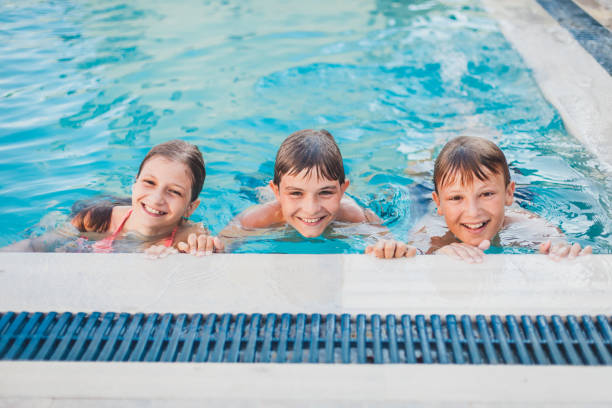 istock Children at the Swimming Pool 1140329600