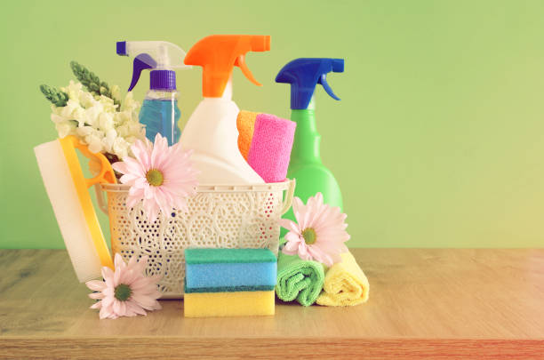 istock Spring cleaning concept with supplies on wooden table 1140329962