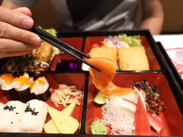 istock chopsticks and sashimi with japanese bento 1140330013