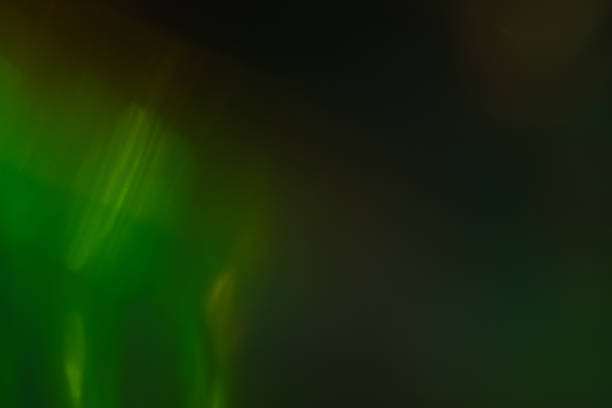istock blur abstract green defocused lens flare glow 1140330242