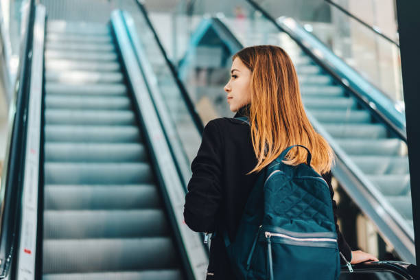 istock Airport girl backpacker 1140332703
