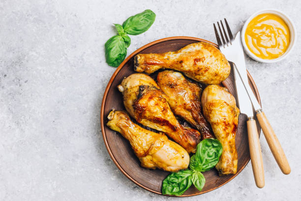 istock Roasted chicken legs cooked with sauce from mustard and olive oil 1140333499