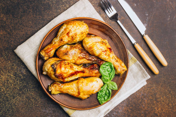 istock Roasted chicken legs cooked with sauce from mustard and olive oil 1140333507