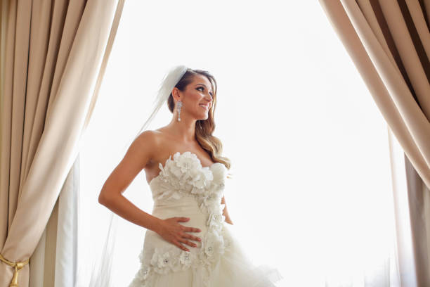 istock Beautiful bride posing indoor on her wedding day 1140333556