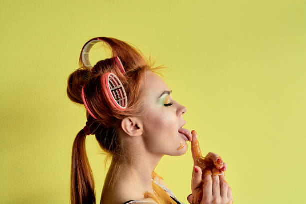 istock Young redhead woman with shugaring paste on her hands, face, body and chest. 1140336445