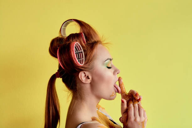istock Young redhead woman with shugaring paste on her hands, face, body and chest. 1140336467
