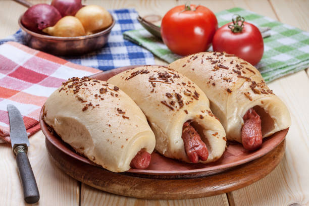 istock Sausage baked in dough. 1140337321