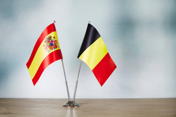 istock Spanish and Belgian flag standing on the table 1140337929
