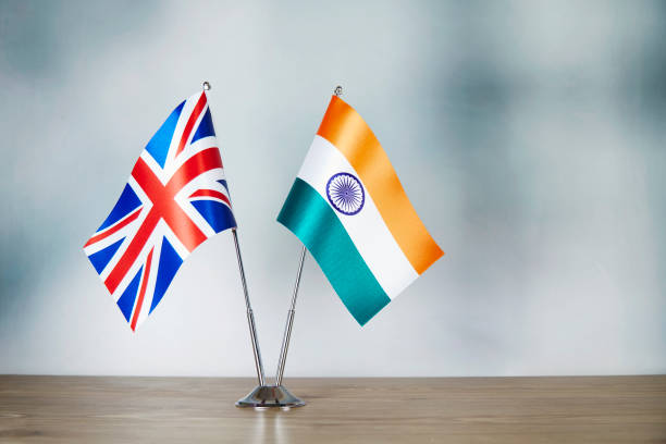 english and indian flag standing on the table - british flag freedom photography english flag imagens e fotografias de stock