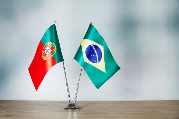 istock Portuguese and Brazilian flag standing on the table 1140338632