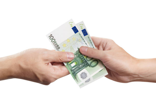 Hands sharing euros Hands sharing euros, isolated on white background alms stock pictures, royalty-free photos & images