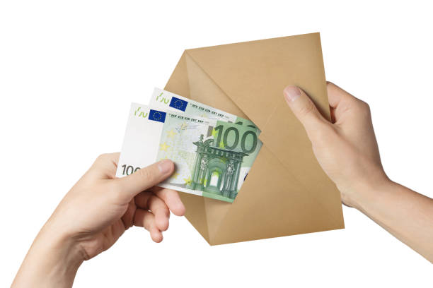 istock Hands getting euros out of the envelope 1140339382