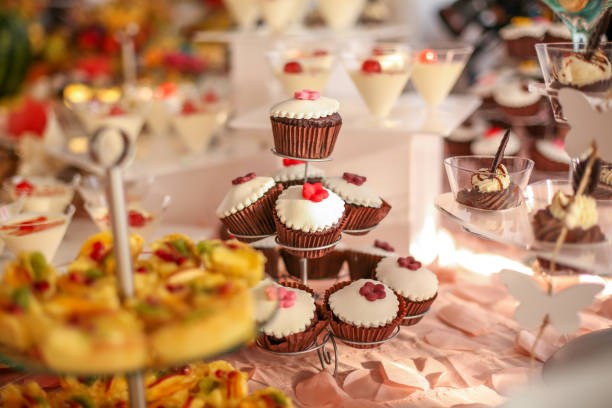 istock Delicious candy bar with cupcakes and other sweets 1140339442