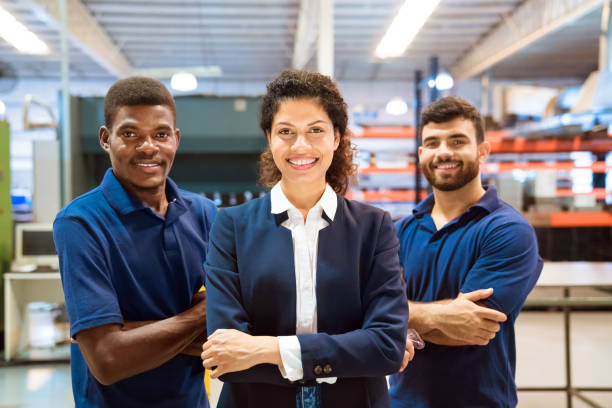 istock Confident female inspector standing ahead of team 1140341158