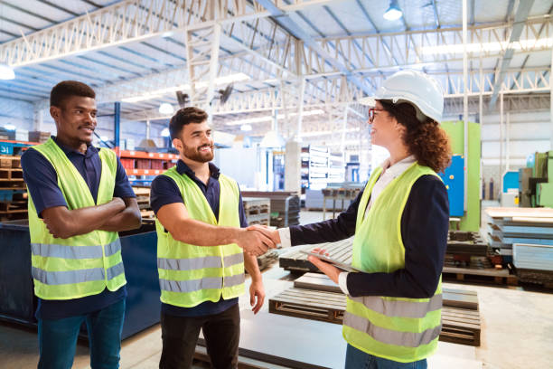 istock Expertise shaking hand with manager in factory 1140342368