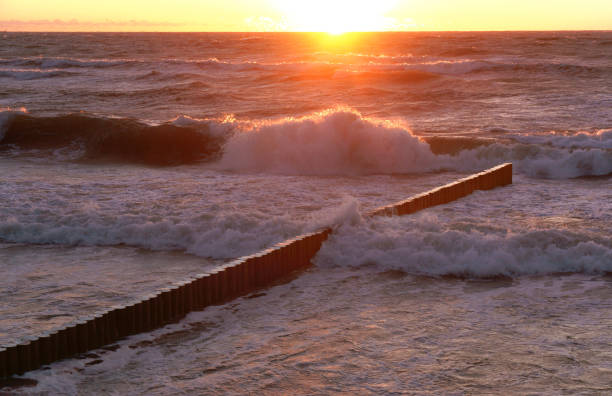 istock beautiful sunrise and waves on the sea 1140345059