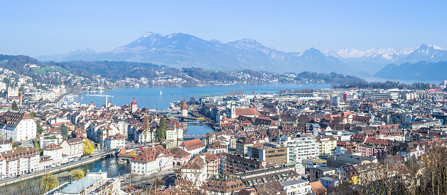 Top view of the city of Lucerne. The architecture of the old town, the historical center. Lake Lucerne and the Alps Mountains.