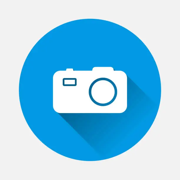 Vector illustration of Vector illustration of a digital camera. Retro camera icon on a blue background a flat image with a long shadow.