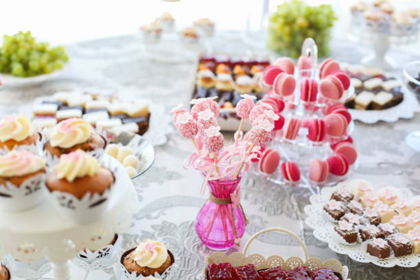 istock Delicious candy bar with cupcakes, cake pops and other sweets 1140350776