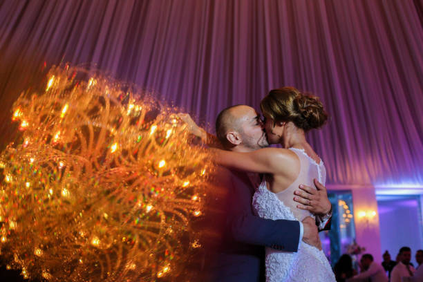 istock Beautiful wedding couple dancing on their wedding 1140351356