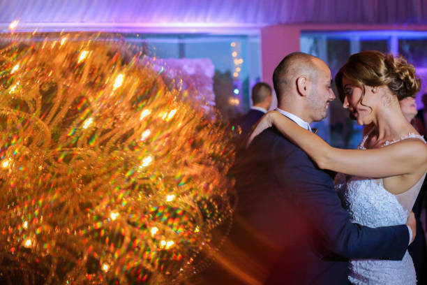 istock Beautiful wedding couple dancing on their wedding 1140351370