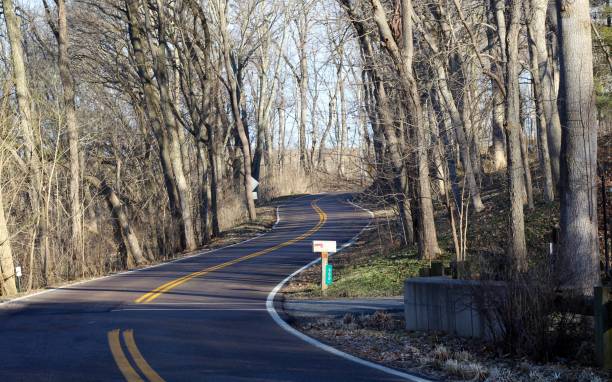 istock Country Road up a Hill 1140353742