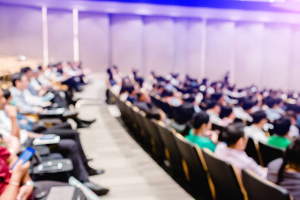 istock Blurry of auditorium for shareholders' meeting or seminar event 1140354954
