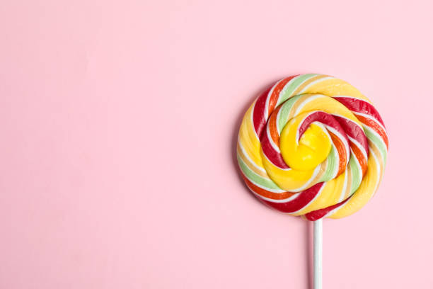istock Sweet candy with space for text on color background, closeup 1140355059