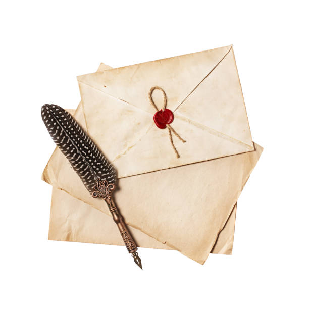 istock Vintage composition with yellowed letter in envelope and luxury quill pen 1140356610