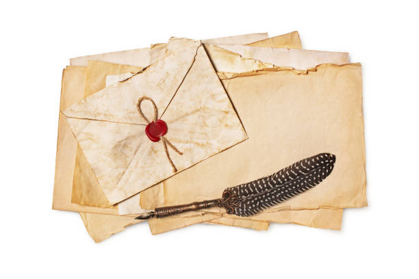 istock Vintage composition with mockup of empty old?yellowed paper sheets with luxury quill pen 1140356625