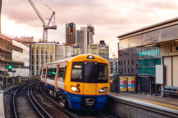 istock Passenger train leaving the railway station 1140356651