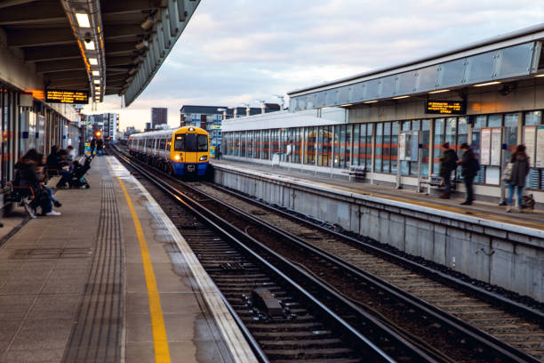 istock Passenger train leaving the railway station 1140356677