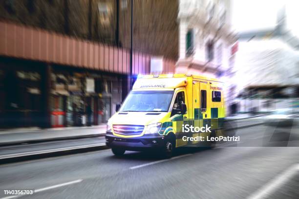 Ambulance Respond To An Emergency In Downtown Stock Photo - Download Image Now - Ambulance, UK, London - England
