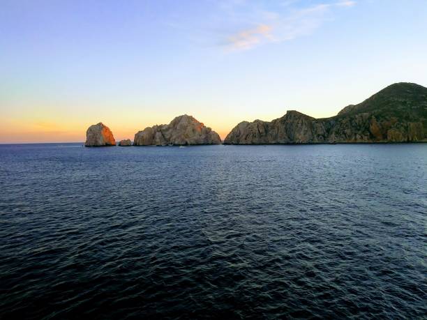 istock Cabo san lucas sunset over bay 1140356809